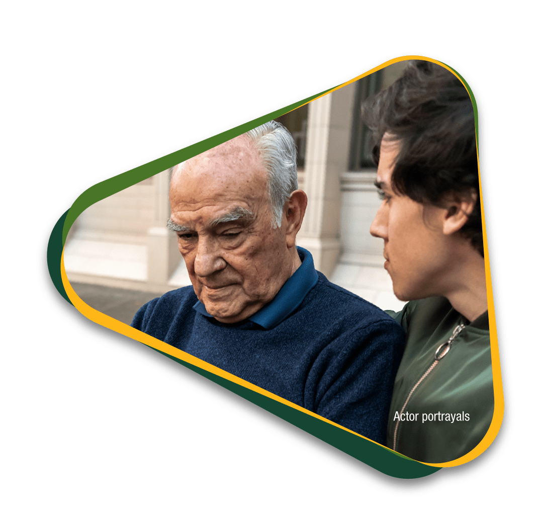 Actor portrayal of elderly father talking to adult son about his experience with agitation that may happen with dementia due to Alzheimer's disease